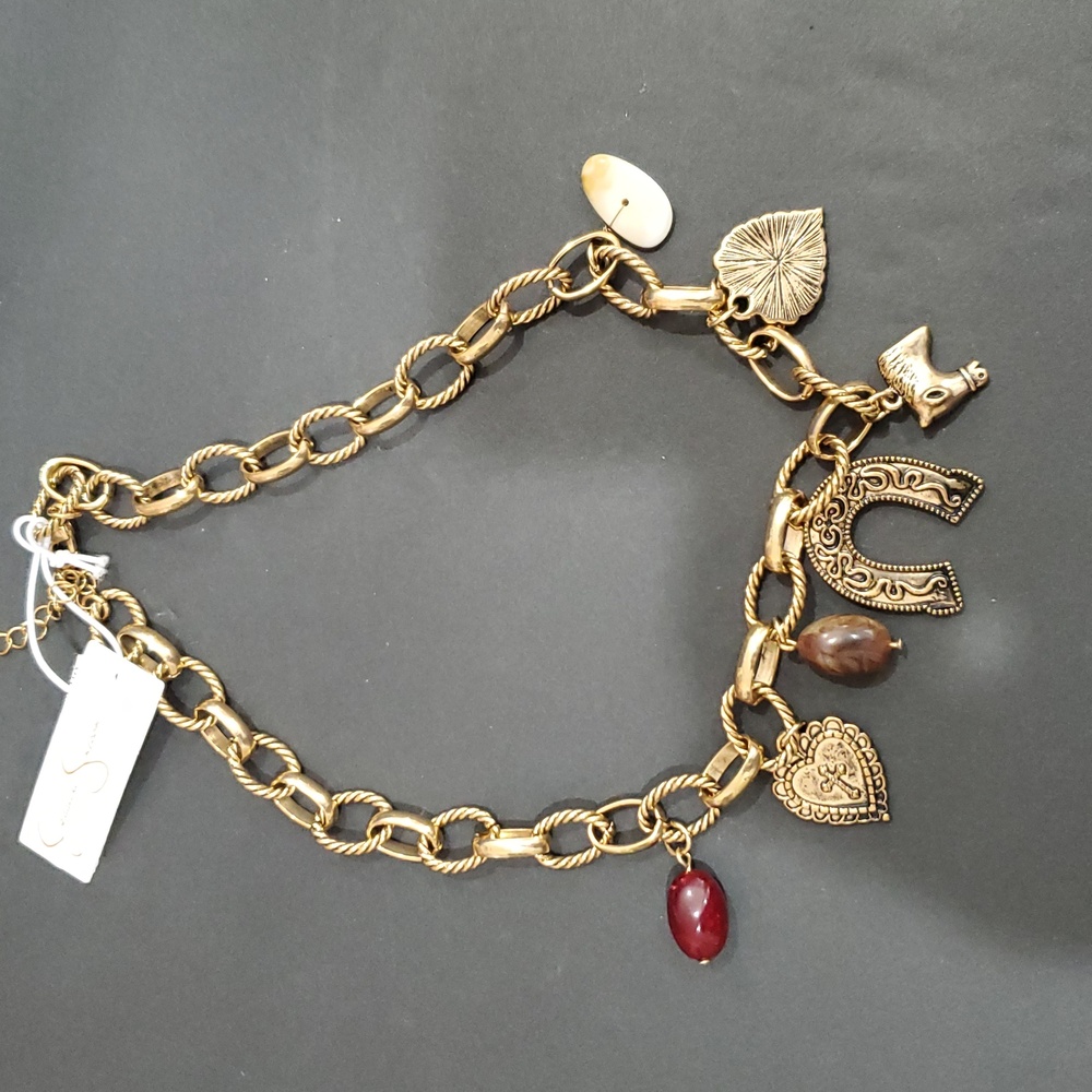 Jessica Simpson boho southwestern theme interlock gold tone lucky charm necklace
